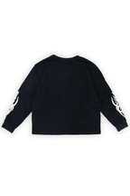 Back of the Whittier twofer tee in the Flames 99 colorway with white flame graphics on both black waffle sleeves