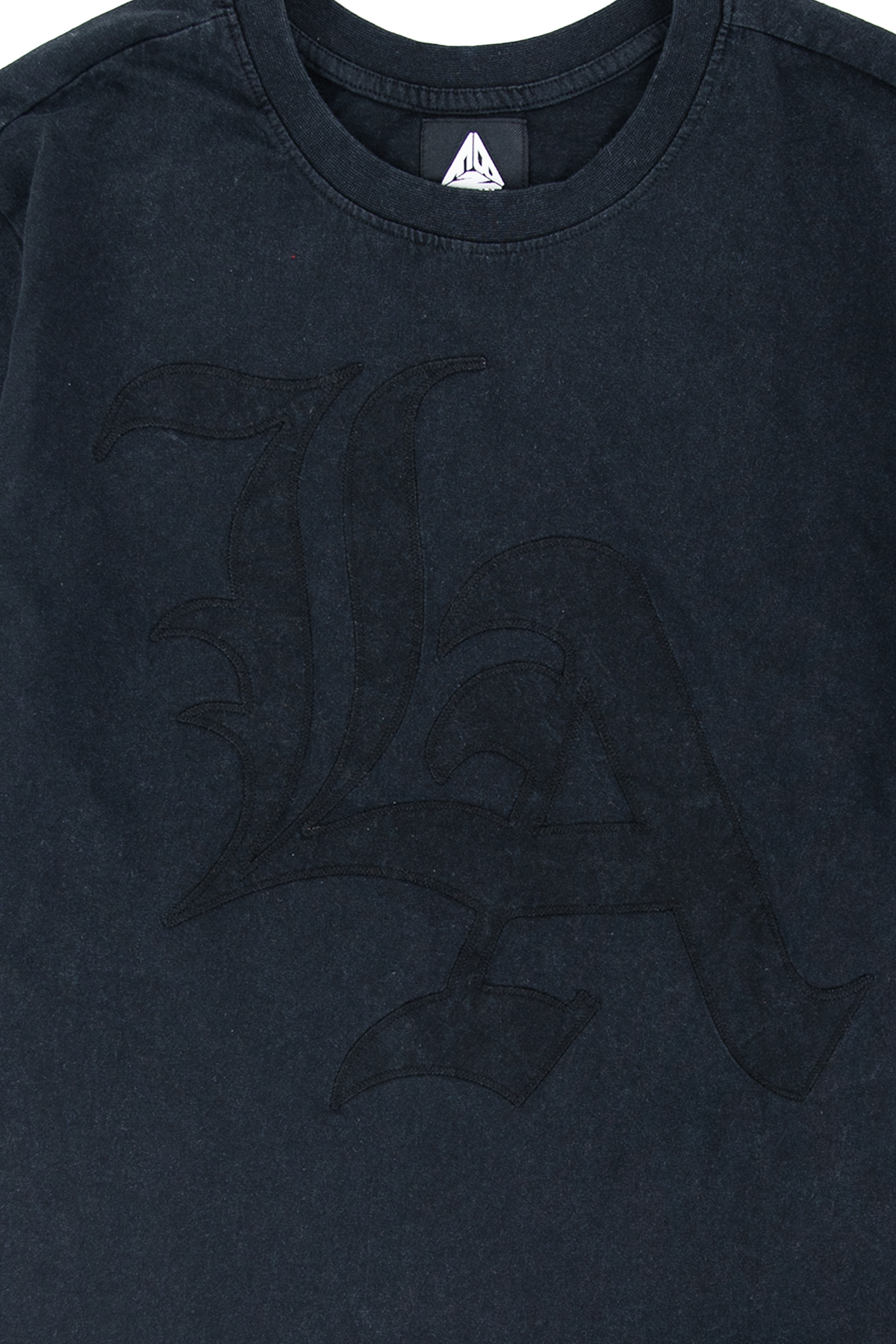 Whittier twofer tee LA colorway, detail of the grey gothic cross graphics on the white waffle sleeve