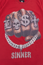 Legacy tee detail showing the diamond Cuban link chain and iced gothic SINNER pendant
