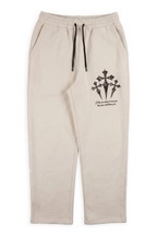 Rafe off-white fleece relaxed sweatpants with a lace-textured gothic cross cluster printed on the thigh
