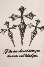 Rafe sweatpants detail showing the three gothic crosses and script print in black on off-white fleece